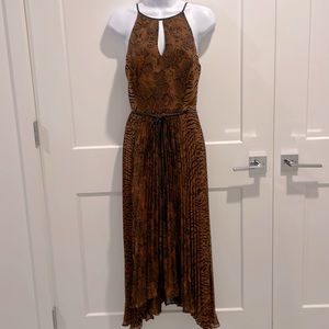 White House Black Market animal print midi dress. Pleated skirt, back zip size 6
